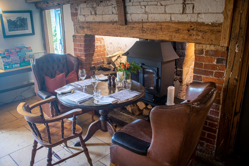 Dining by the fire at the Eyston Arms